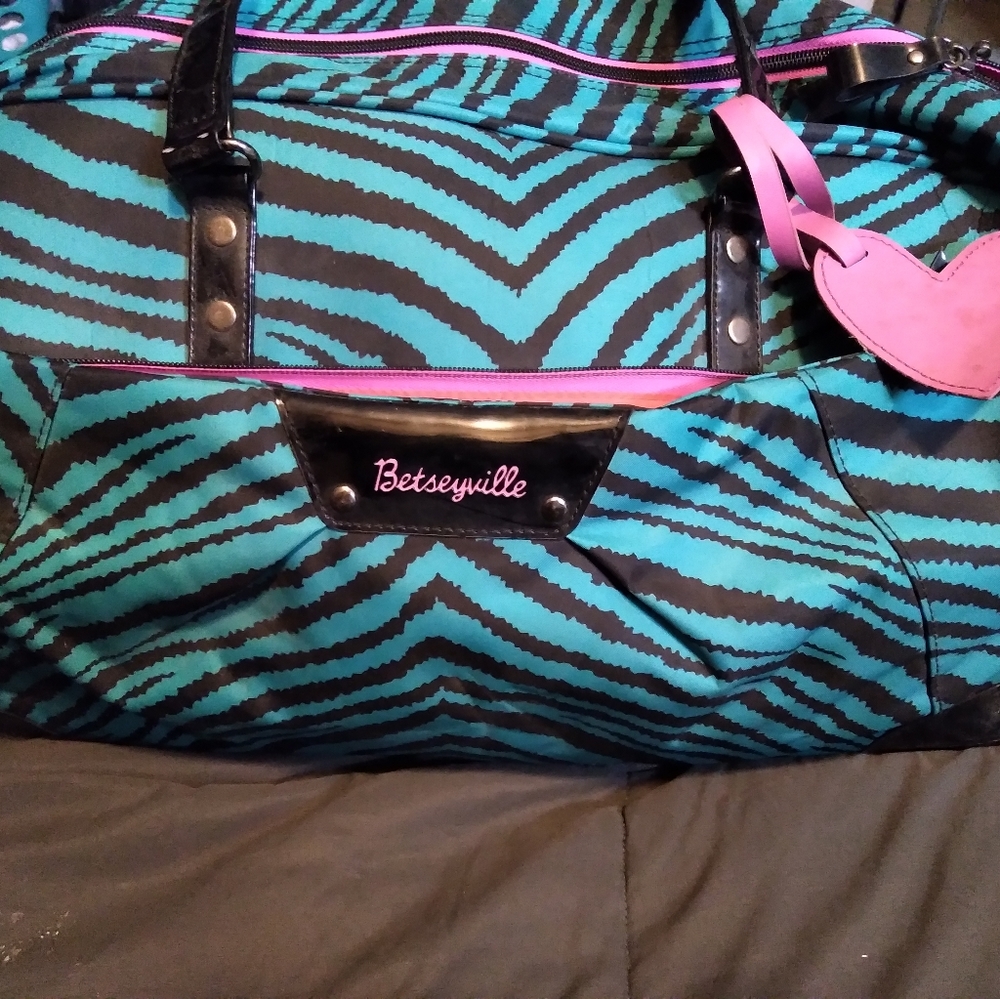 Betsey Johnson luggage wheel bag